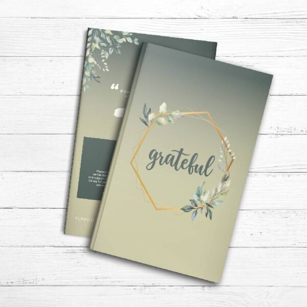 A Gratitude Journal with the word grateful on it.