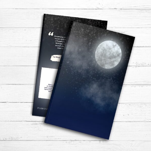 A Dream Journal with a moon and clouds on it.