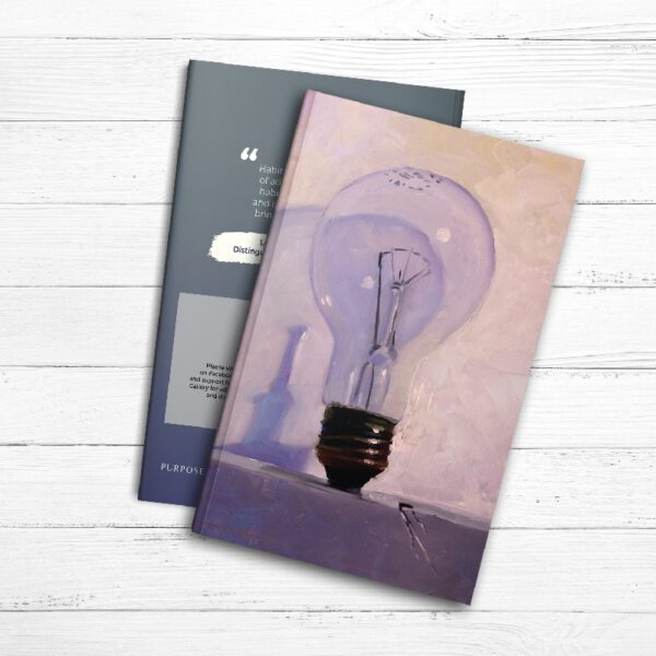 A Groovy Life Journal with a light bulb on it.